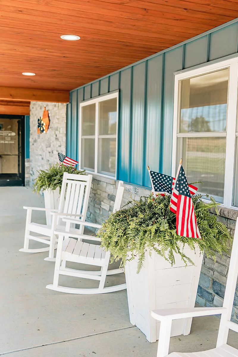 front porch with rocking chairs